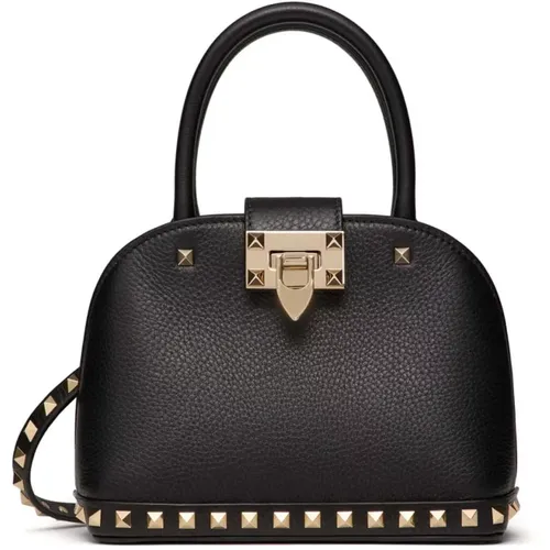 Stilvolle Tote Tasche,Schwarze Gehämmerte Lederhandtasche mit Platin-Nieten - Valentino Garavani - Modalova