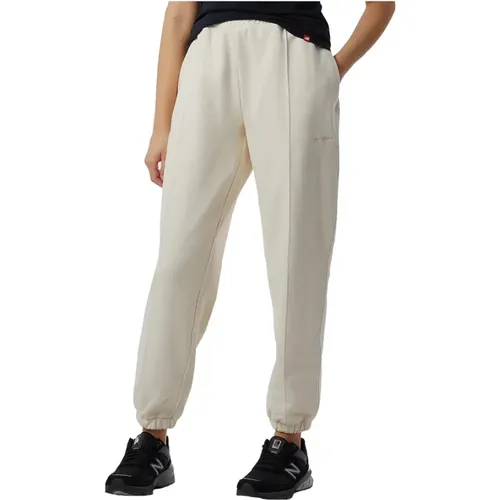 Sweatpants , female, Sizes: M, XS - New Balance - Modalova