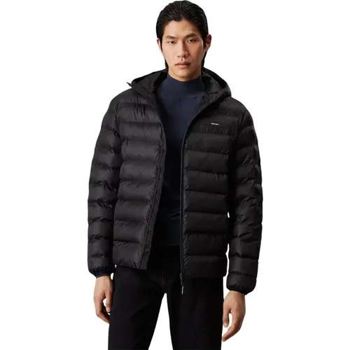 Kapuzenpuffjacke Schwarz Nylon , Herren, Größe: M - Calvin Klein - Modalova