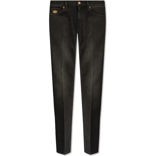 Jeans mit schmaler Passform , Herren, Größe: W33 - Versace - Modalova