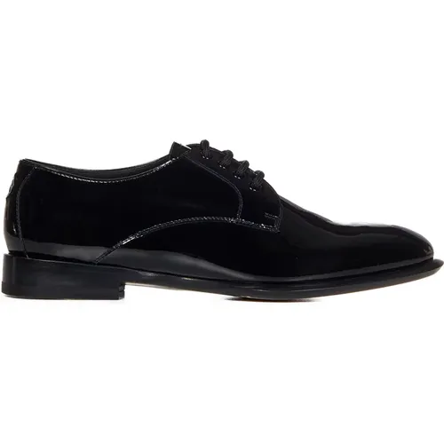 Schwarze flache Schuhe mit Schnürung vorne - alexander mcqueen - Modalova