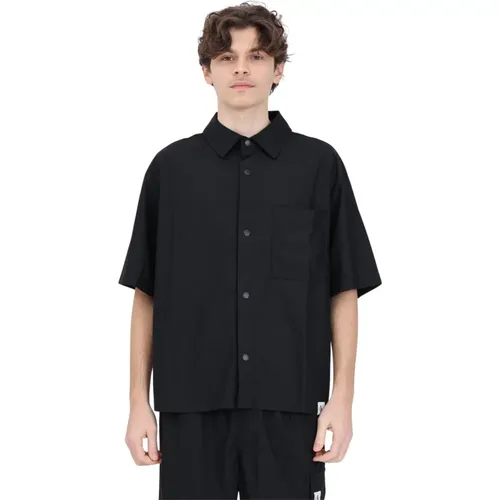 Schwarzes Herrenhemd mit Knöpfen vorne - Calvin Klein Jeans - Modalova