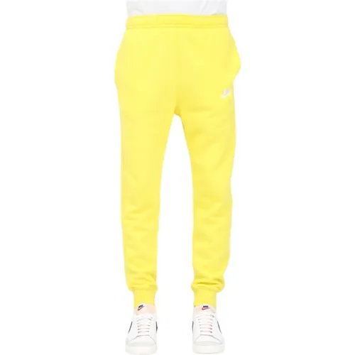 Gelbe Hose mit Verstellbarem Bund und Elastischen Knöcheln , Herren, Größe: XS - Nike - Modalova