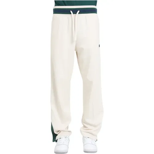 Beige und Grün Sportswear Snap Pant , Herren, Größe: M - New Balance - Modalova