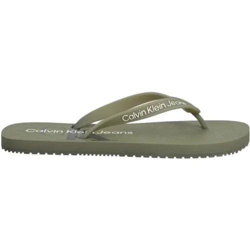 Grüne flache Schuhe mit Logodruck - Calvin Klein - Modalova