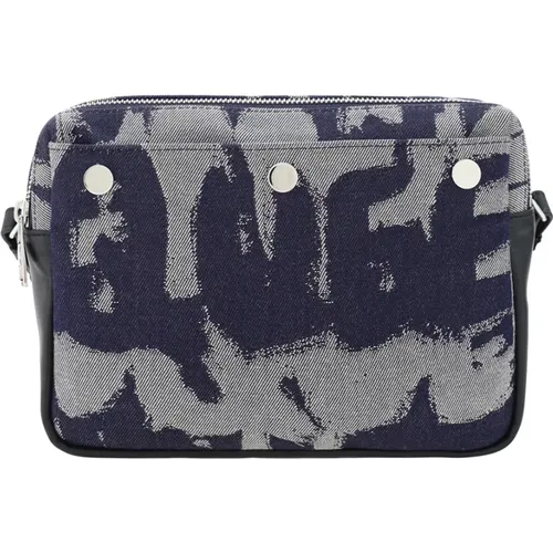 Indigo Denim Schultertasche mit Graffiti-Muster - alexander mcqueen - Modalova