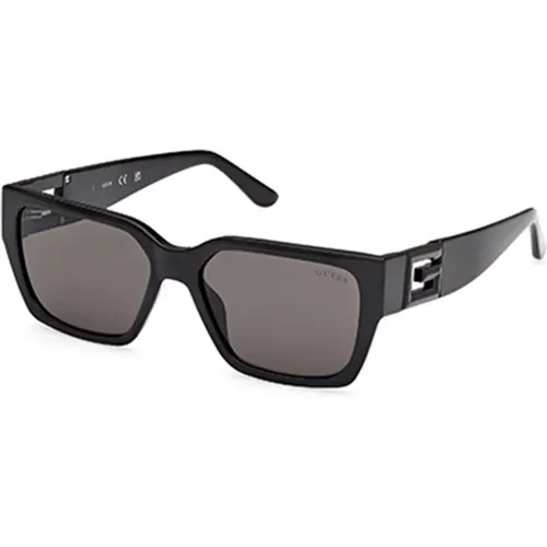 Stylische Sonnenbrille in Schwarz und Grau , Herren, Größe: 55 MM - Guess - Modalova