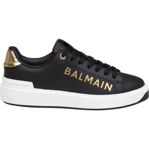 Schwarze/Goldene Kalbsleder Sneakers - Balmain - Modalova