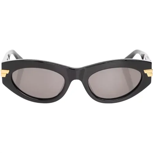 Schwarze Cat-Eye Sonnenbrille mit Goldakzenten - Bottega Veneta - Modalova