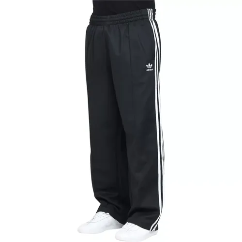 Schwarze Sportliche Baggy Fit Firebird Hose , Herren, Größe: XS - adidas Originals - Modalova