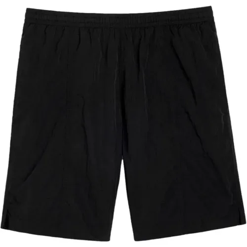 Schwarze Shorts mit Herz-Logo - Ami Paris - Modalova