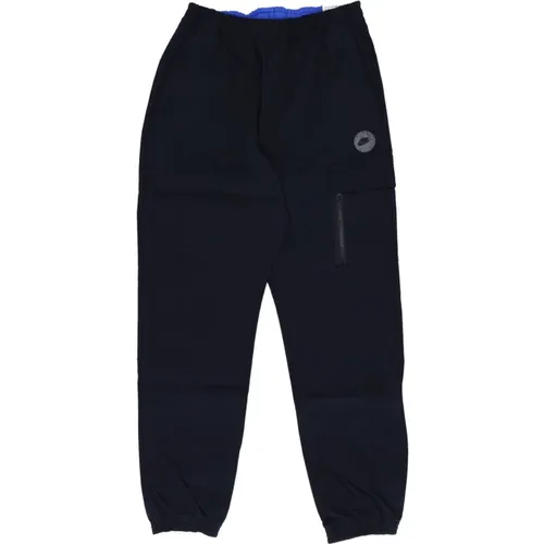 Utility Gewebte Sportbekleidung Hose Schwarz/Blau , Herren, Größe: L - Nike - Modalova