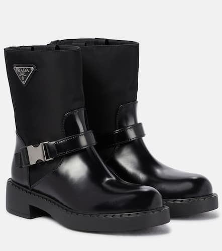 Re-Nylon and leather ankle boots - Prada - Modalova