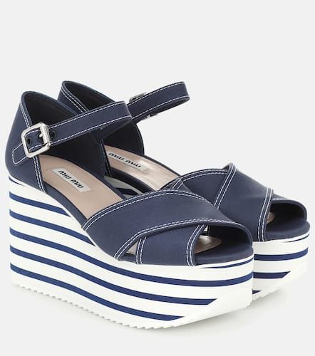 Miu Miu Plateausandalen aus Canvas - Miu Miu - Modalova