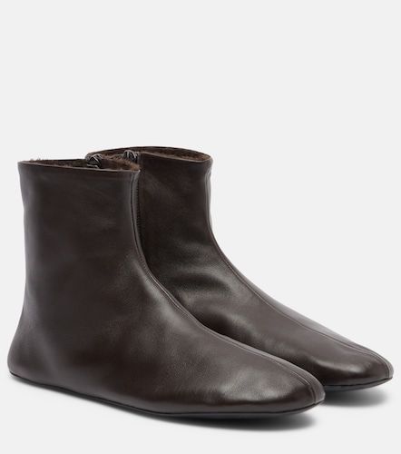 Stella shearling-lined leather ankle boots - The Row - Modalova