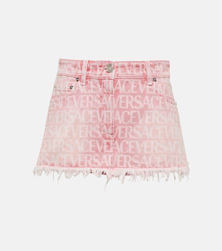 Minifalda en denim Allover - Versace - Modalova