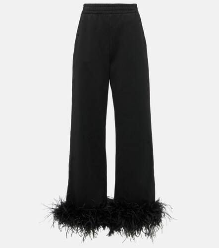 Feather-trimmed cotton sweatpants - Prada - Modalova