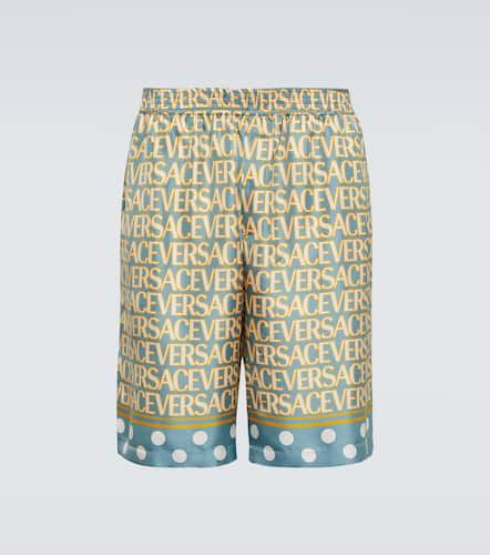 Shorts de seda Allover - Versace - Modalova