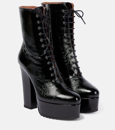 AlaÃ¯a Leather platform ankle boots - Alaia - Modalova