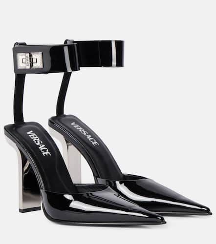 Patent leather slingback pumps - Versace - Modalova