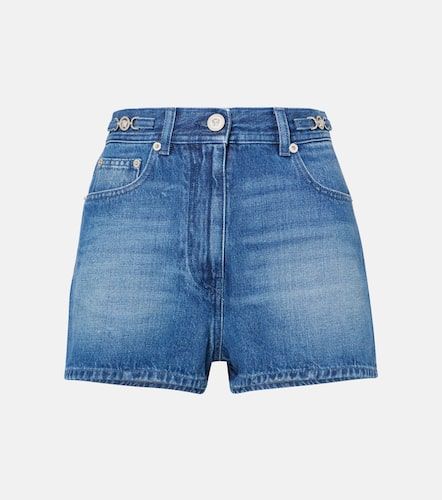 Shorts de denim con efecto desgastado - Versace - Modalova