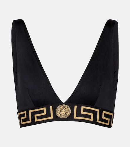 Versace Top de bikini con logo - Versace - Modalova