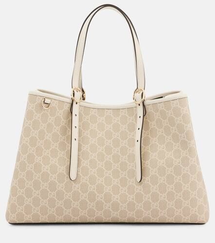 GG Emblem Medium leather-trimmed tote bag - Gucci - Modalova