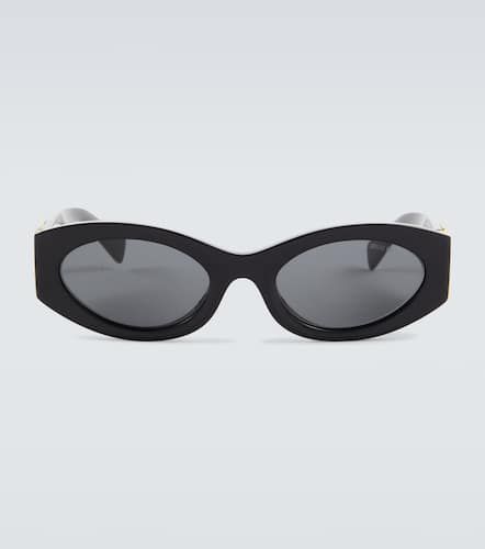 Miu Miu Logo oval sunglasses - Miu Miu - Modalova