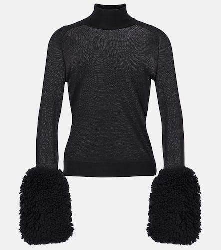 AlaÃ¯a Faux fur-trimmed wool turtleneck top - Alaia - Modalova