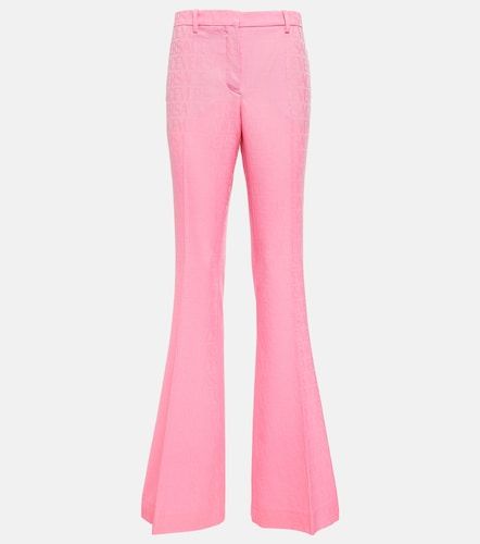 Allover flared wool pants - Versace - Modalova