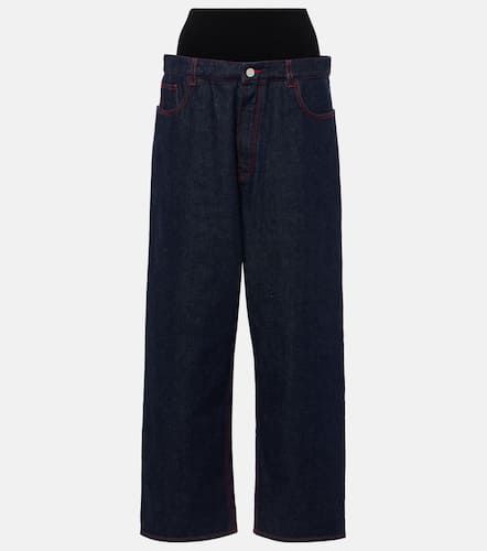 AlaÃ¯a Low-rise wide-leg jeans - Alaia - Modalova