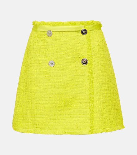 Minifalda de bouclé de tweed - Versace - Modalova