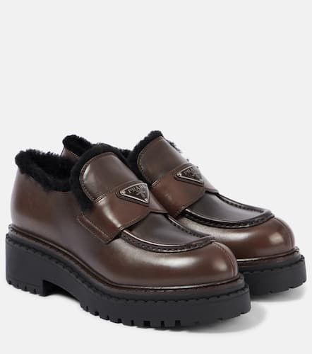 Shearling-lined brushed leather loafers - Prada - Modalova