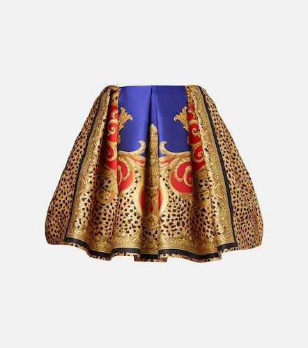 Minifalda plisada de satén estampada - Versace - Modalova