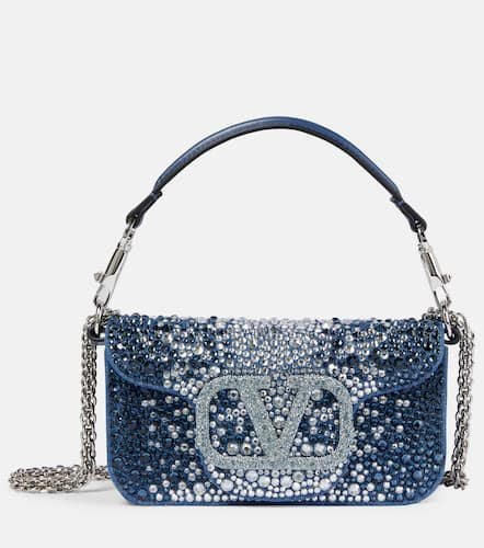 Locò Small embellished denim shoulder bag - Valentino Garavani - Modalova