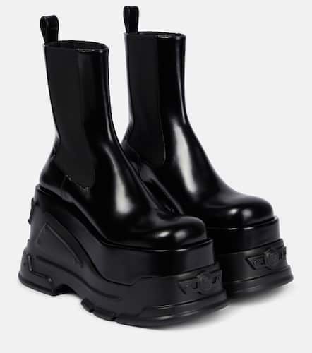 Intrico leather platform ankle boots in black - Versace