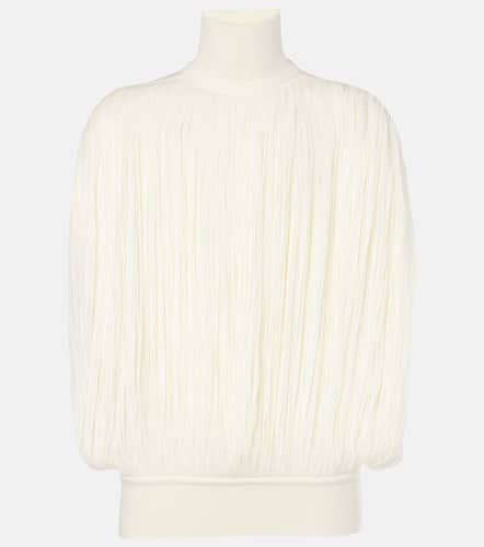 Alaïa Jersey de cuello alto de lana con flecos - Alaia - Modalova