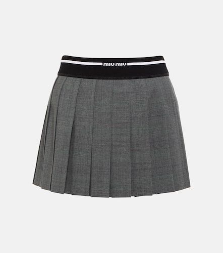 Minifalda plisada de lana virgen - Miu Miu - Modalova