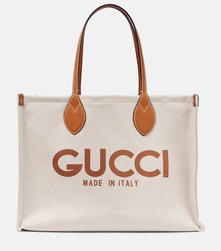 Logo leather-trimmed canvas tote bag - Gucci - Modalova