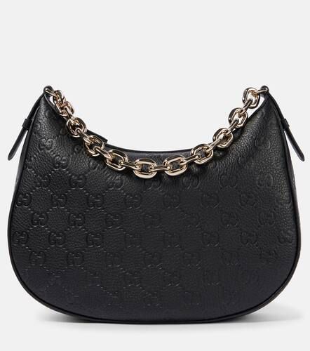 GG Medium debossed leather shoulder bag - Gucci - Modalova