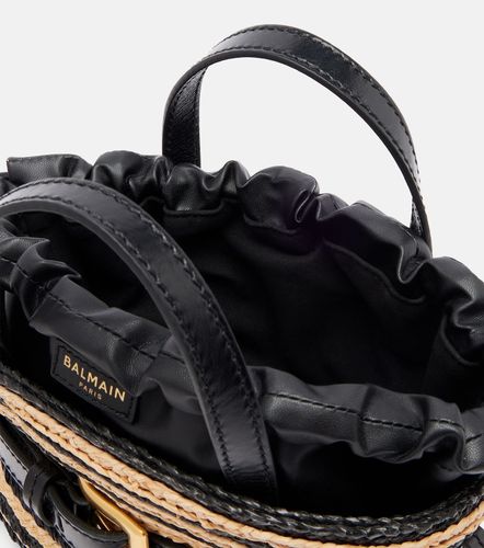 Raffia-effect striped top-handle bag - Balmain - Modalova