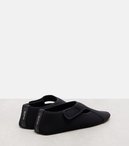 Flex leather-trimmed ballet flats - Alaia - Modalova