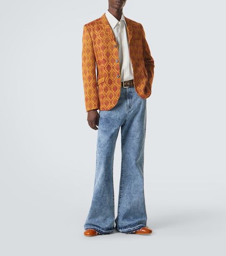 High-rise flared jeans - Junya Watanabe - Modalova