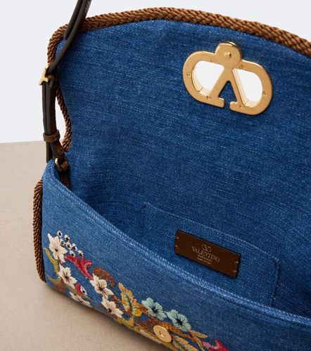 DeVain Small embroidered denim shoulder bag - Valentino Garavani - Modalova