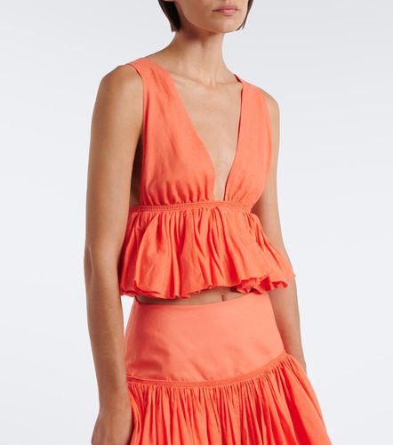 Alaïa Top peplum en mezcla de algodón y lino a rayas - Alaia - Modalova