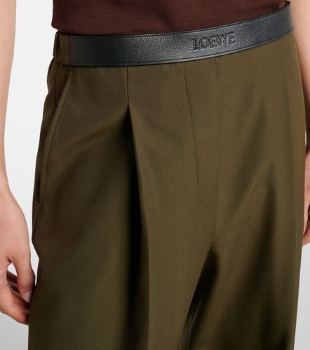 Leather-trimmed pleated wool flared pants - Loewe - Modalova