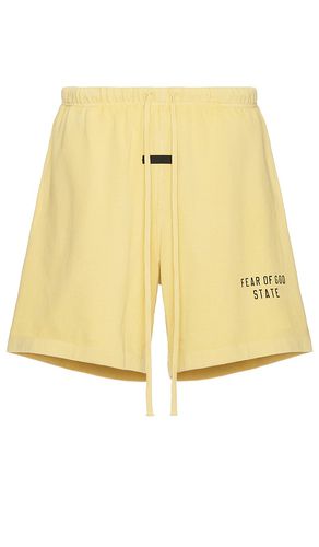 Heavy jersey soccer short en color amarillo talla L en Ámbar - Yellow. Talla L (también en M, S, XL) - Fear of God ESSENTIALS - Modalova