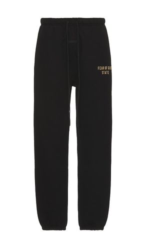 Pantalón deportivo en color talla L en - Black. Talla L (también en M, S, XL, XS, XXL) - Fear of God ESSENTIALS - Modalova