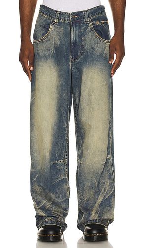Wing print studded lowrise colossus jeans en color talla 30 en - Blue. Talla 30 (también en 32, 34, 36) - Jaded London - Modalova