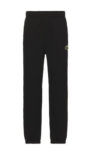 Pantalón deportivo relaxed fit en color talla M en - Black. Talla M (también en S, XL/1X) - Lacoste - Modalova